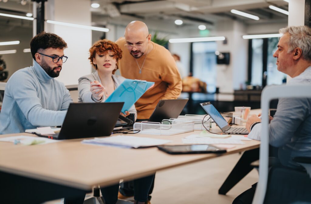A marketing team working together inside the office.